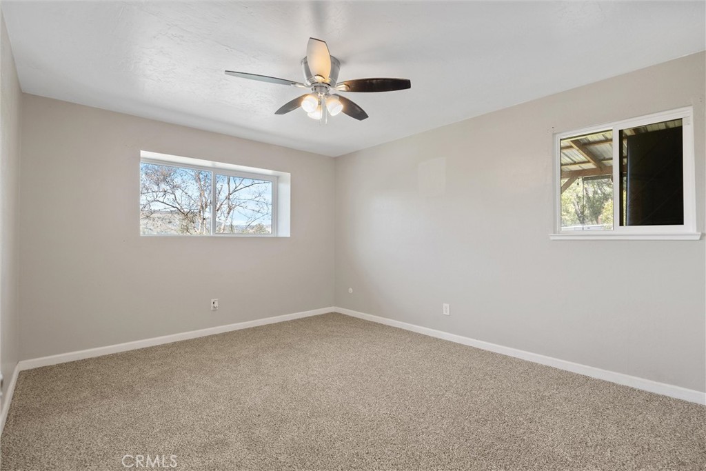 904 Long Bar Road Oroville, CA 95966 - Photo 36 of 50 a view of an empty room with a window