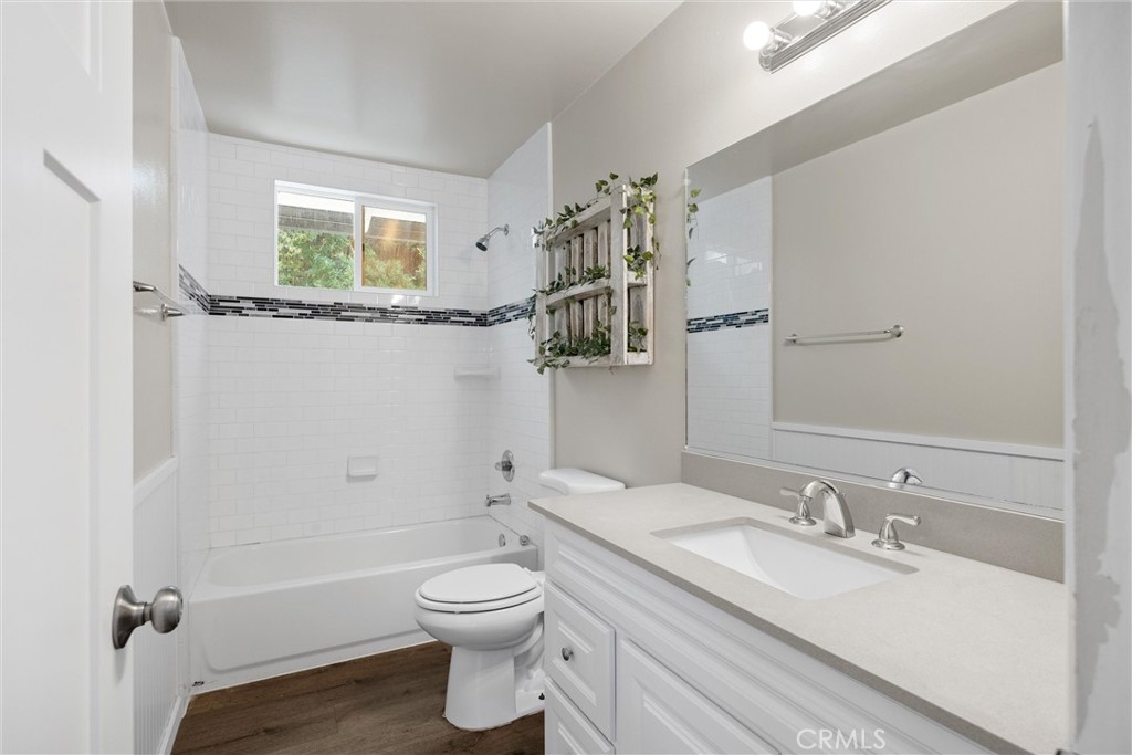 904 Long Bar Road Oroville, CA 95966 - Photo 39 of 50 a bathroom with a granite countertop sink toilet and shower