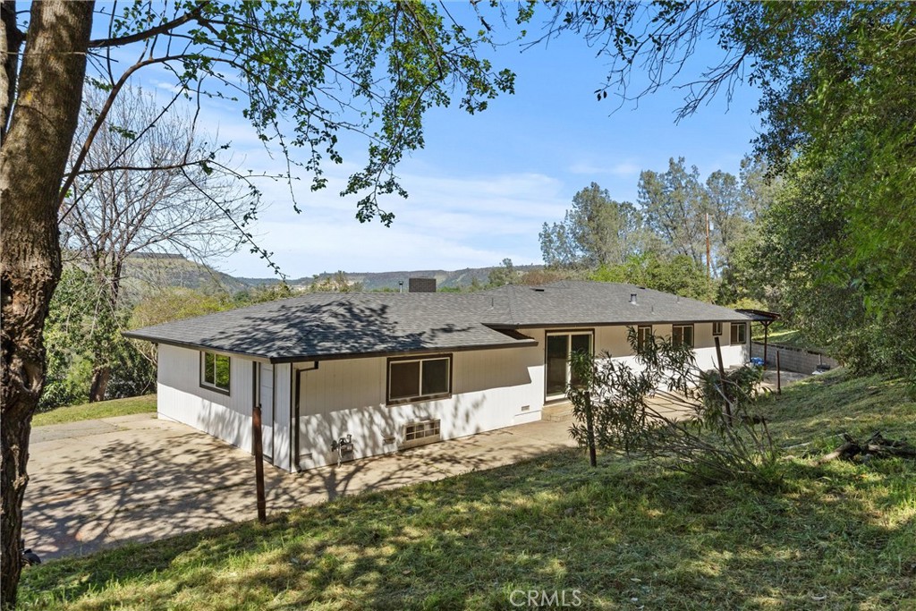 904 Long Bar Road Oroville, CA 95966 - Photo 41 of 50 a view of a house with a yard