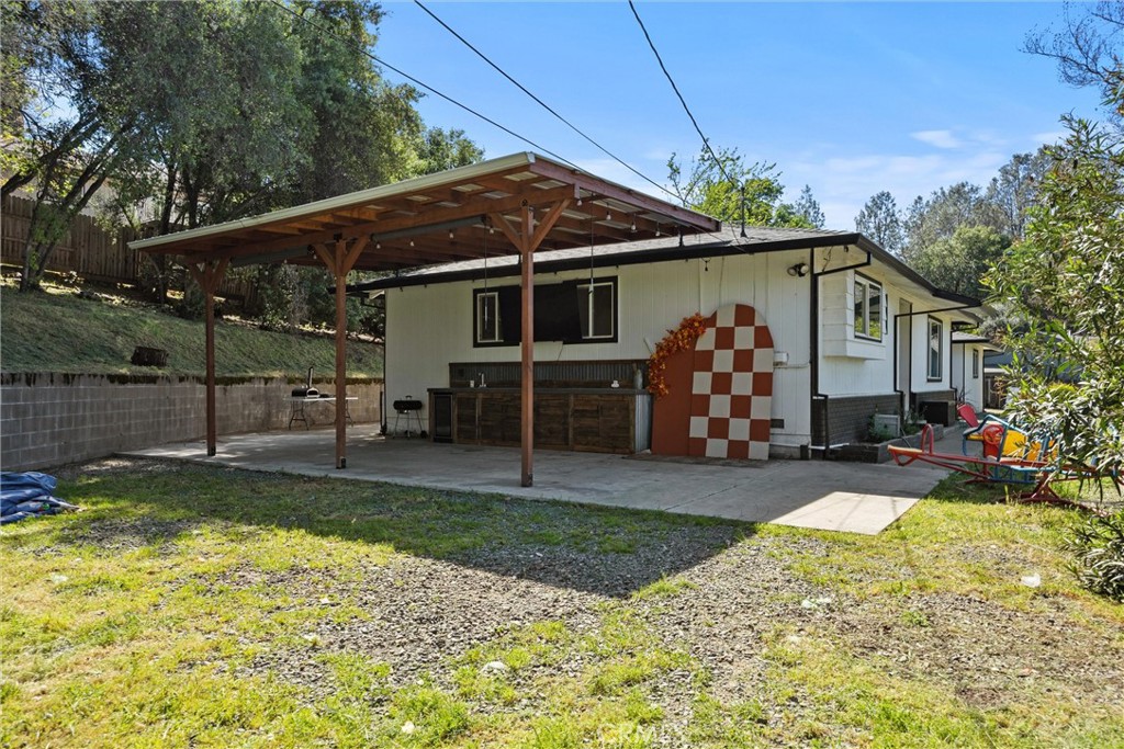 904 Long Bar Road Oroville, CA 95966 - Photo 43 of 50 a view of a house with back yard