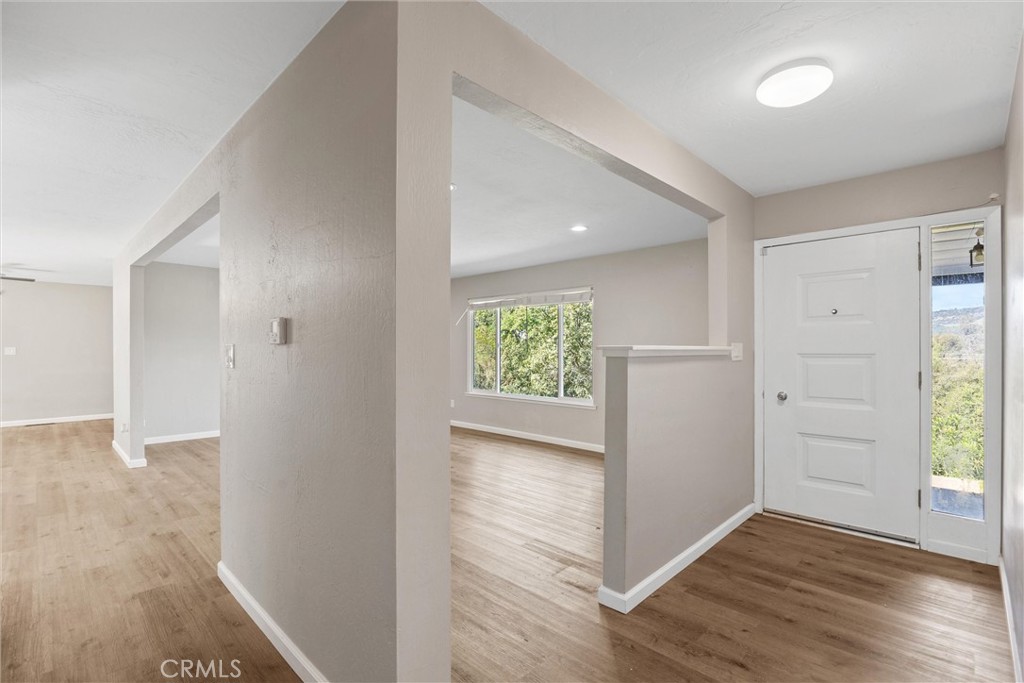 904 Long Bar Road Oroville, CA 95966 - Photo 9 of 50 wooden floor in an empty room with a window
