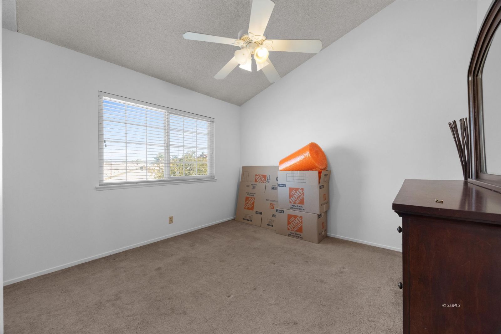 736 Fendrick Circle Ridgecrest, CA 93555 - Photo 39 of 49 an empty room with a window and a flat screen tv