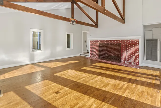 a living room with a fireplace