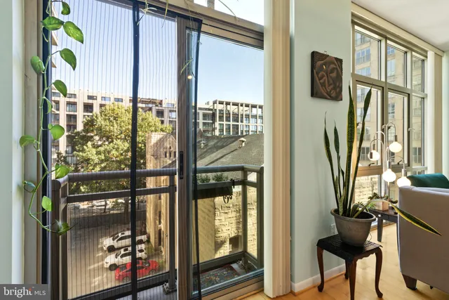 a view of walk in closet with large window