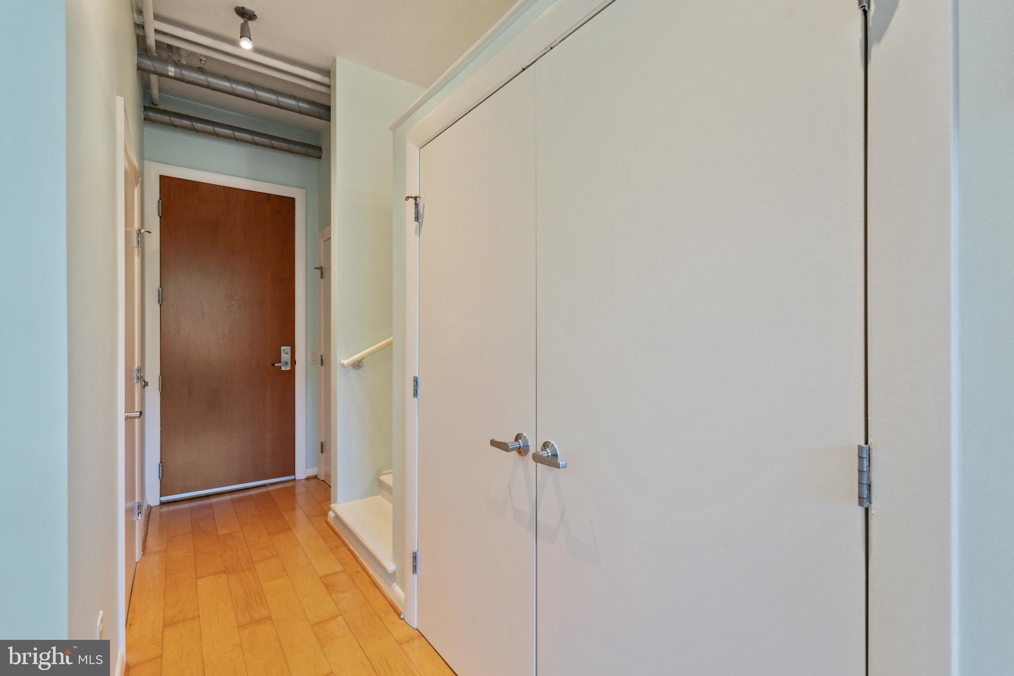 811 4th Street Northwest, Unit 502 Washington, DC 20001 - Photo 24 of 36 Hallway with a Closet and Laundry