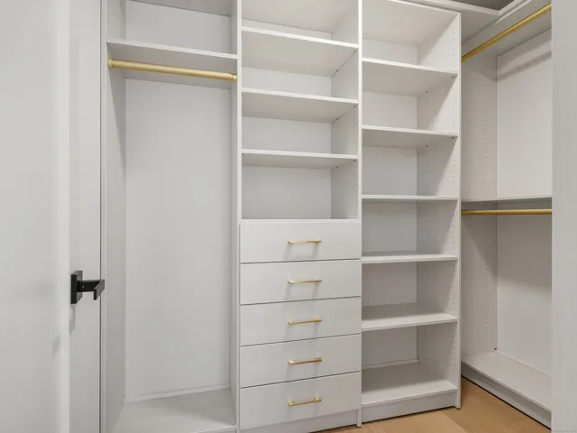 a view of a living room with washer and dryer