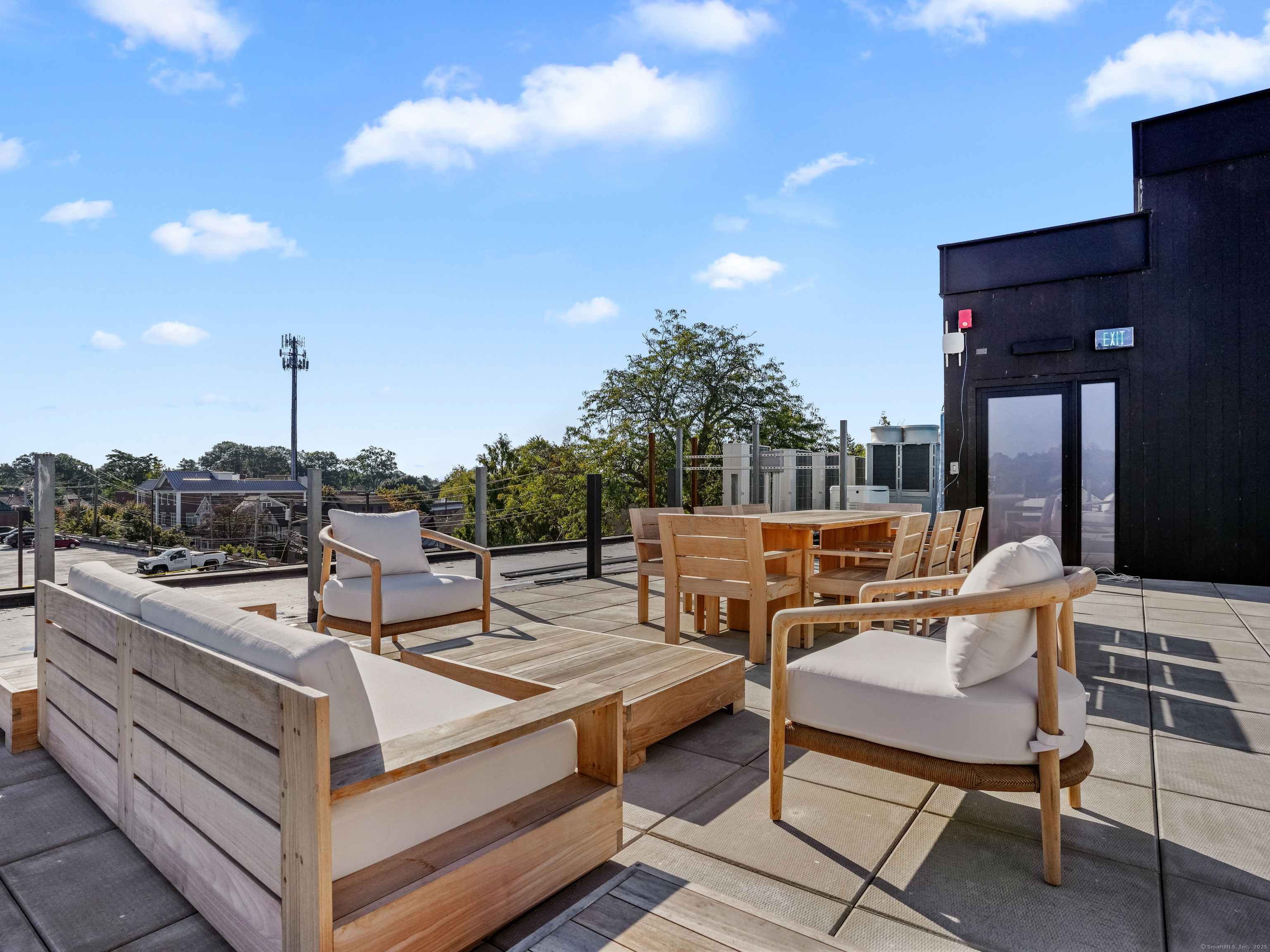 116 Sherman Street, Unit 1 Fairfield, CT 06824 - Photo 4 of 32 a outdoor space with a patio