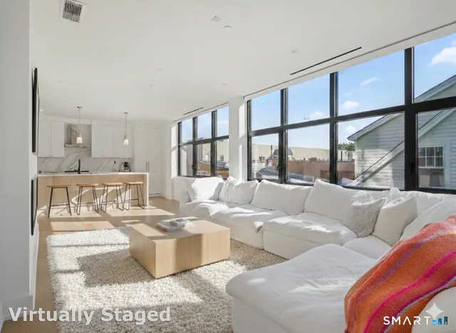 a bathroom with a toilet a sink and a bathtub