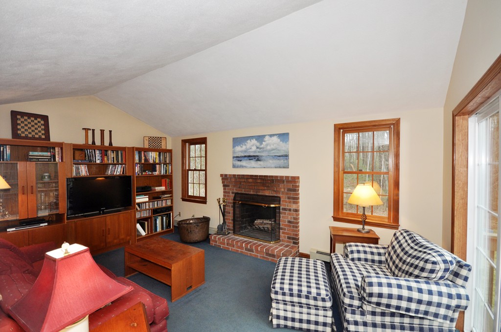 29 Blanchard Road Boxborough, MA 01719 - Photo 12 of 30 a living room with furniture and a fireplace