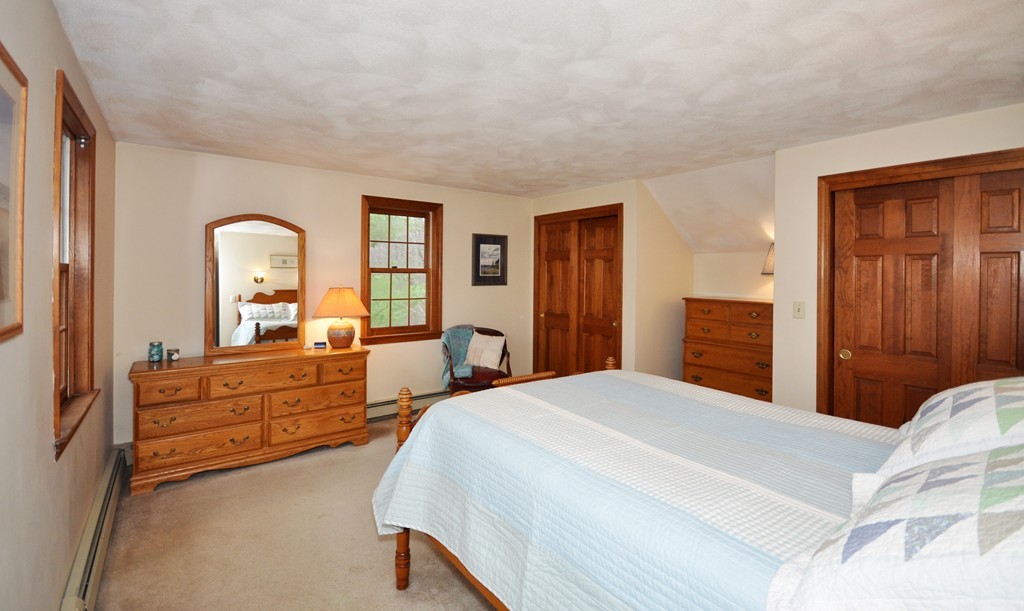 29 Blanchard Road Boxborough, MA 01719 - Photo 17 of 30 a bedroom with a bed and a dresser