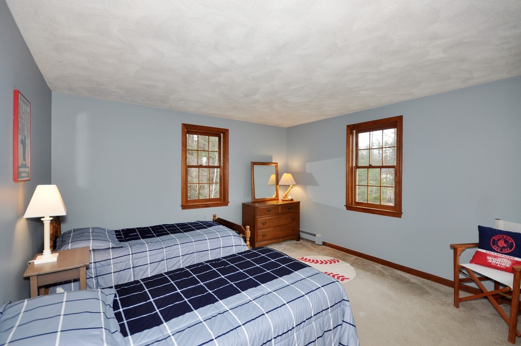 29 Blanchard Road Boxborough, MA 01719 - Photo 18 of 30 a bedroom with a bed and a window