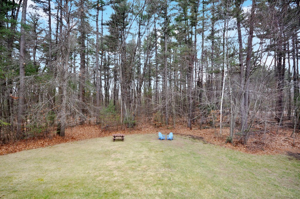 29 Blanchard Road Boxborough, MA 01719 - Photo 27 of 30 a backyard of apartments with large trees
