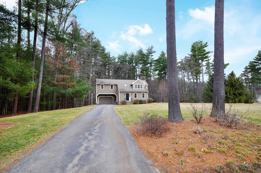 29 Blanchard Road Boxborough, MA 01719 - Photo 29 of 30 a front view of a house with a yard and trees