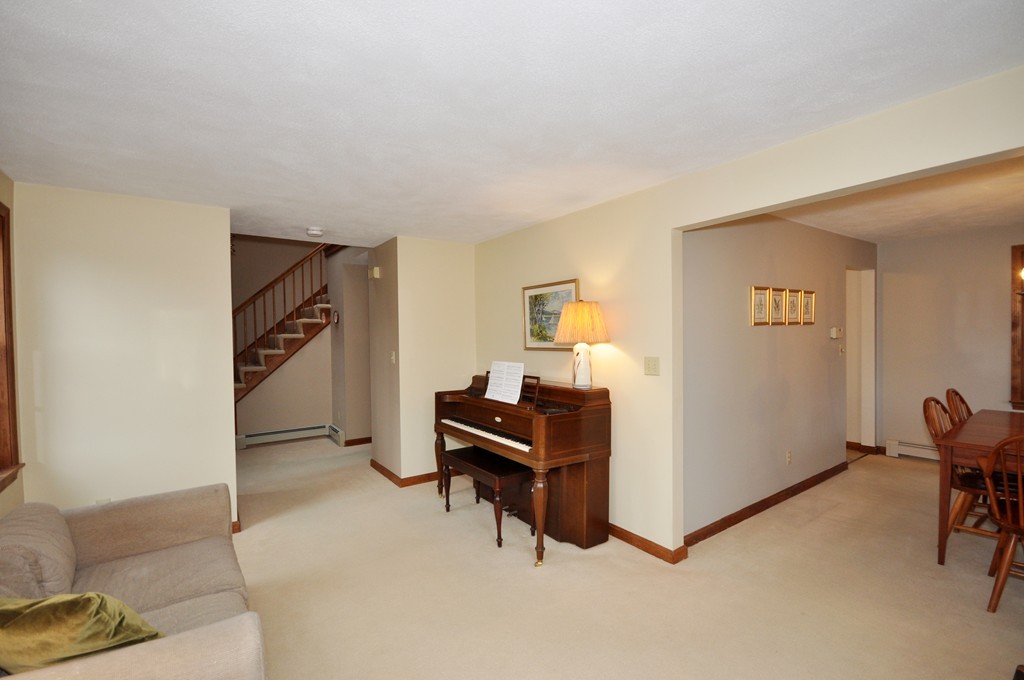 29 Blanchard Road Boxborough, MA 01719 - Photo 5 of 30 a view of a livingroom with furniture and a hallway