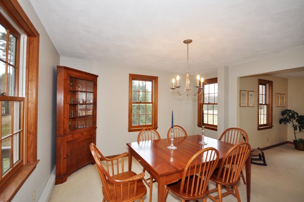 29 Blanchard Road Boxborough, MA 01719 - Photo 7 of 30 a view of a a dining room with furniture window and wooden floor