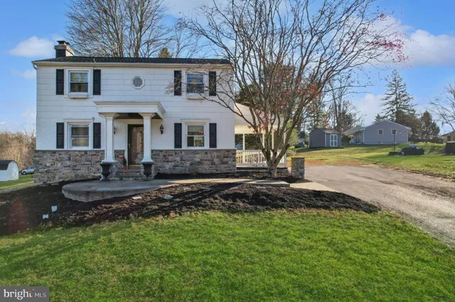 a aerial view of a house with garden