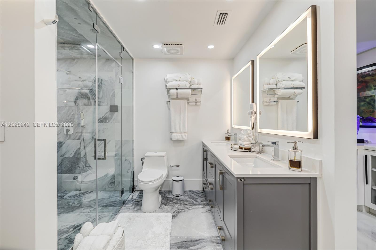 8761 Southwest 56th Street Miami, FL 33165 - Photo 49 of 90 a bathroom with a sink toilet and shower