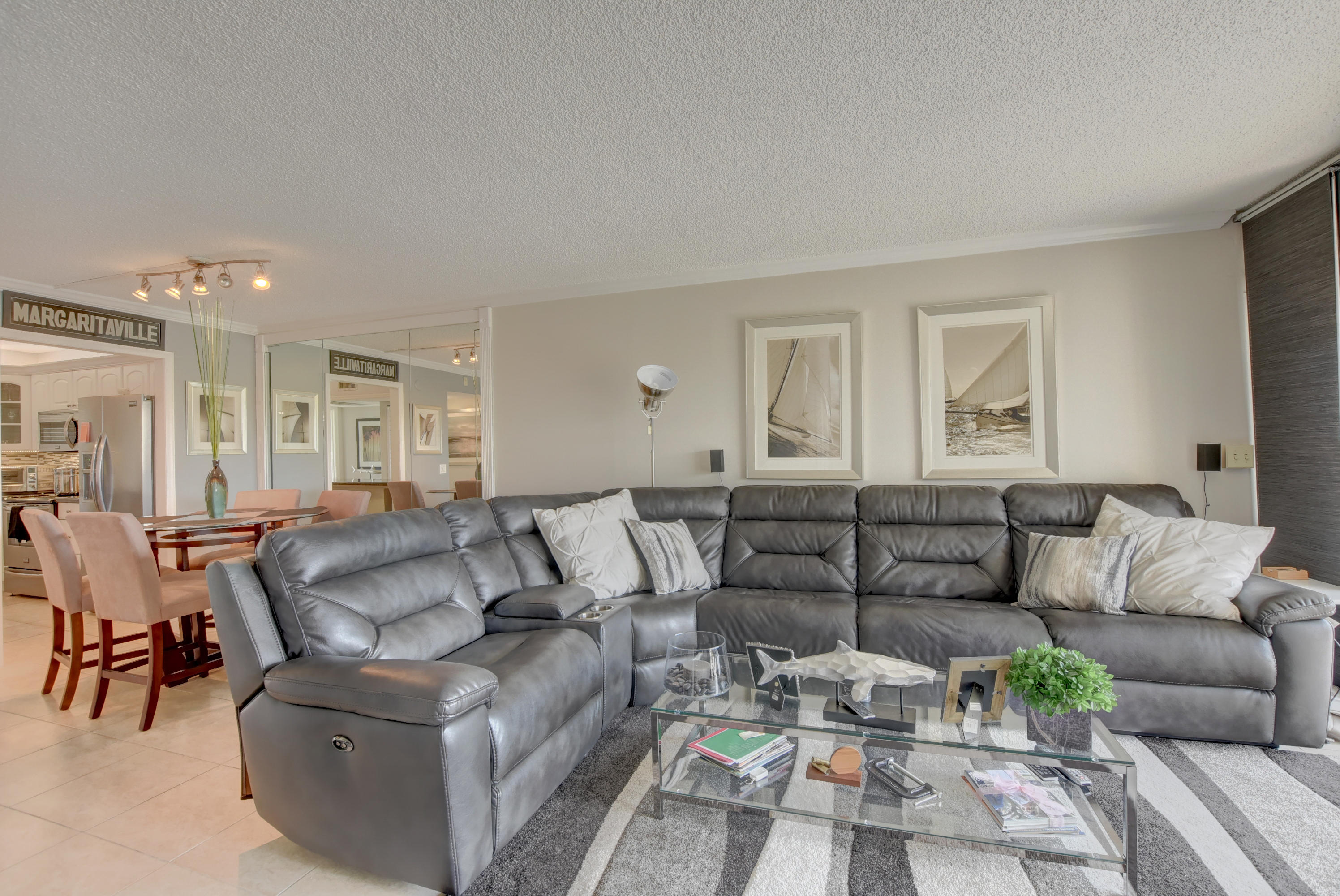 765 Jeffery Street, Unit 1306 Boca Raton, FL 33487 - Photo 15 of 34 a living room with furniture and a large window