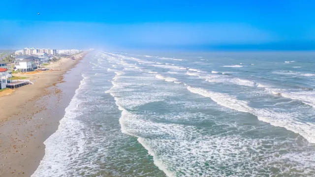 a view of city with ocean