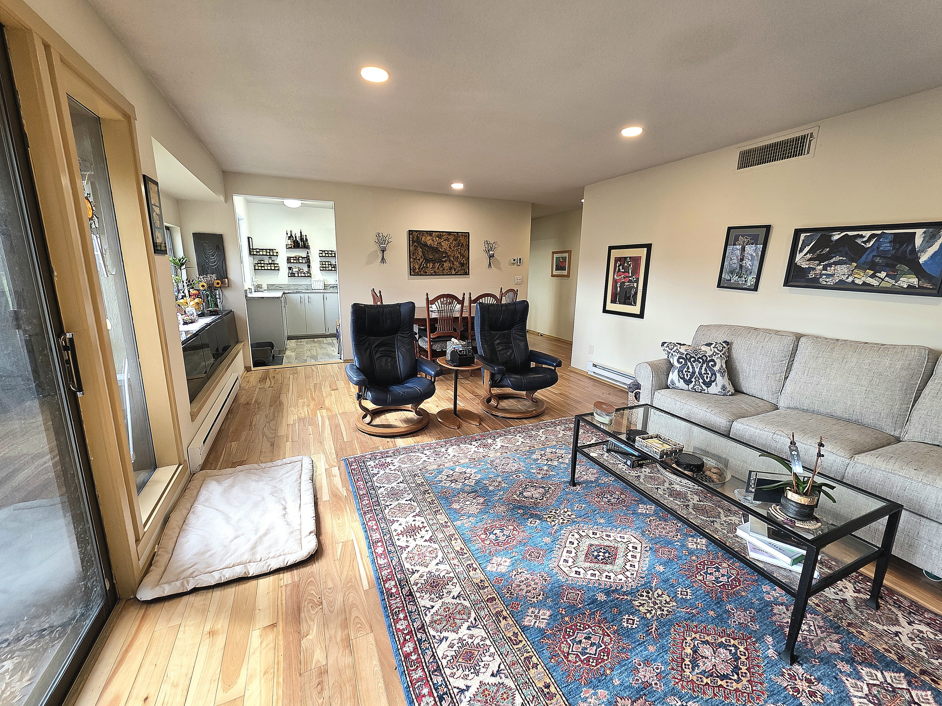39 Heritage Village, Unit C Southbury, CT 06488 - Photo 15 of 39 Large combination living/dining room share the slider and fireplace