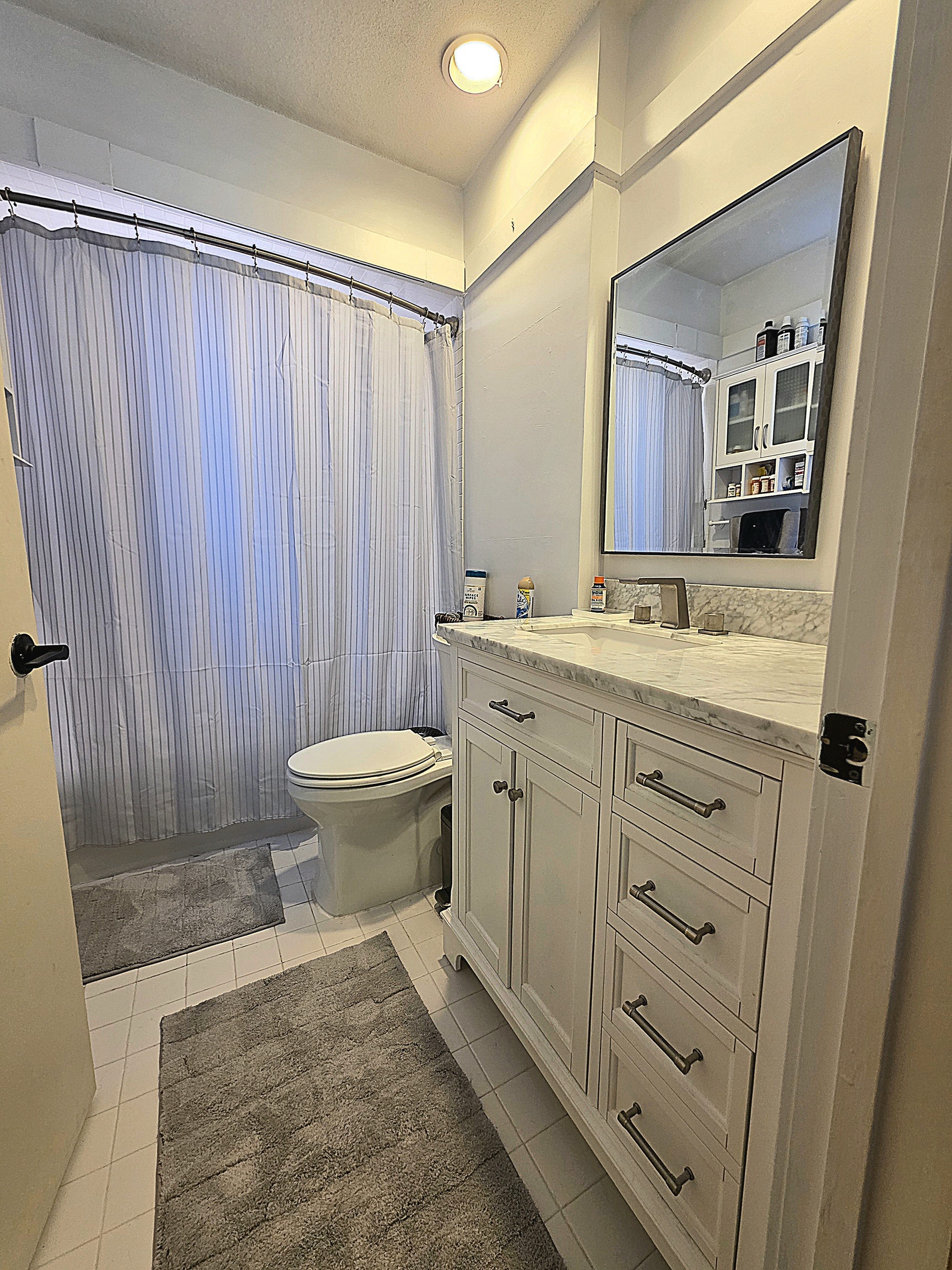 39 Heritage Village, Unit C Southbury, CT 06488 - Photo 27 of 39 New vanity, toilet and electric heater. Reglazed tub and shower.