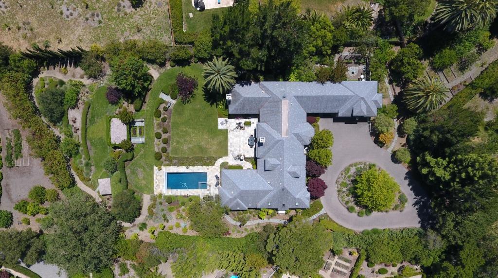 26990 Taaffe Road Los Altos Hills, CA 94022 - Photo 25 of 25 an aerial view of a house with a swimming pool