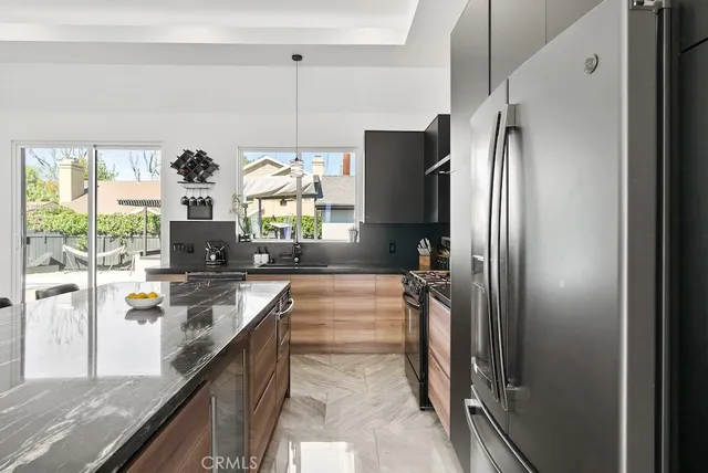 a bathroom with a double vanity sink toilet and shower
