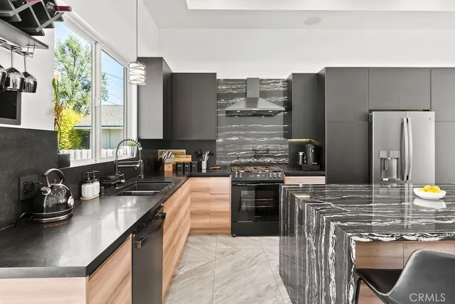 a bathroom with a toilet a sink and shower