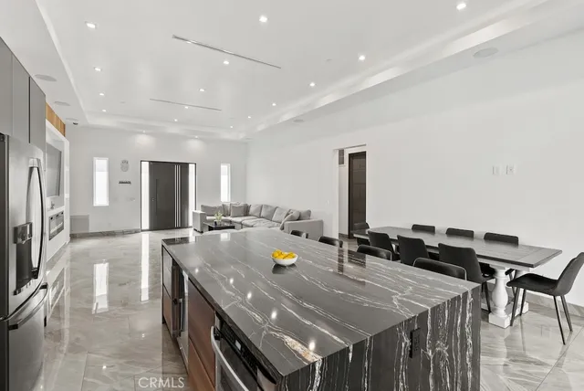 a bathroom with a toilet a sink and shower