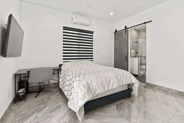 a view of a patio with a table and chairs