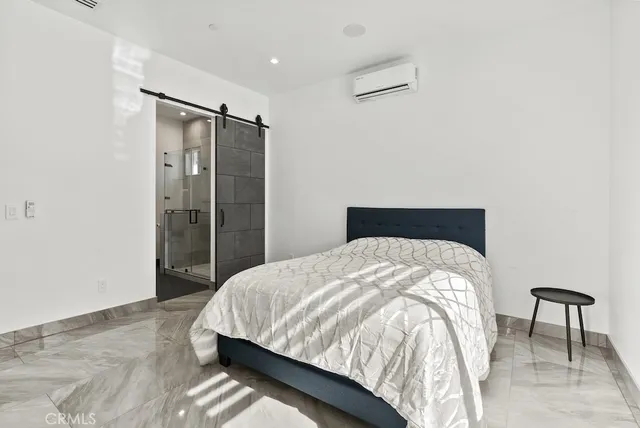 a view of a living room and kitchen