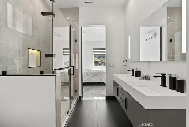 a view of a house with backyard sitting area and garden