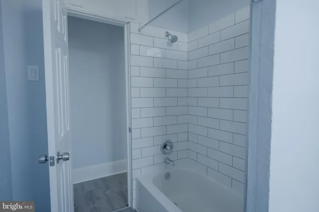 a bathroom with a bathtub