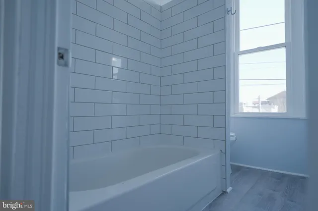 a bathroom with a bathtub