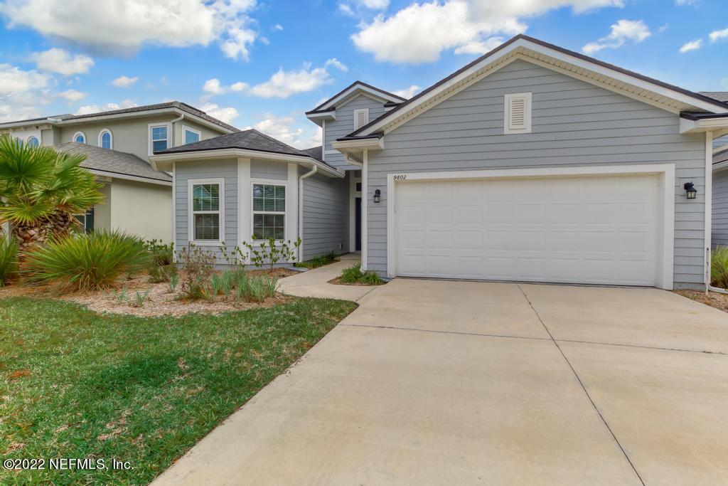 9802 Kevin Road Jacksonville, FL 32257 - Photo 22 of 22 a view of a yard in front of house