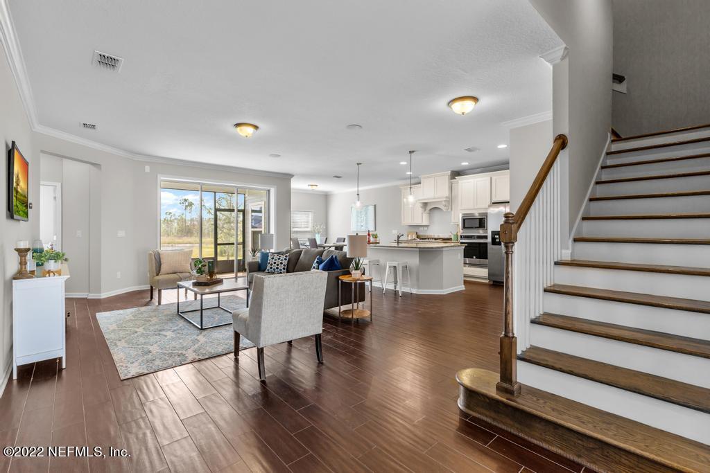 9802 Kevin Road Jacksonville, FL 32257 - Photo 3 of 22 a living room with furniture and wooden floor