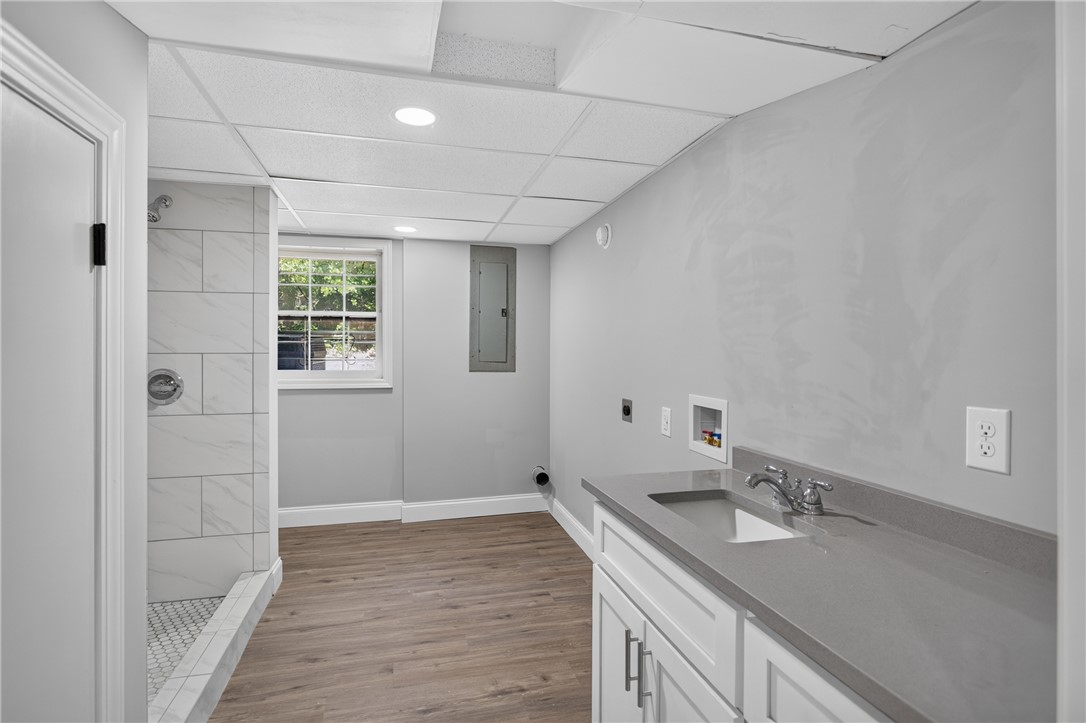 712 Beech Drive Seneca, SC 29678 - Photo 33 of 41 Functional basement space with a bright window, offering a ready-to-finish feel for versatile use.