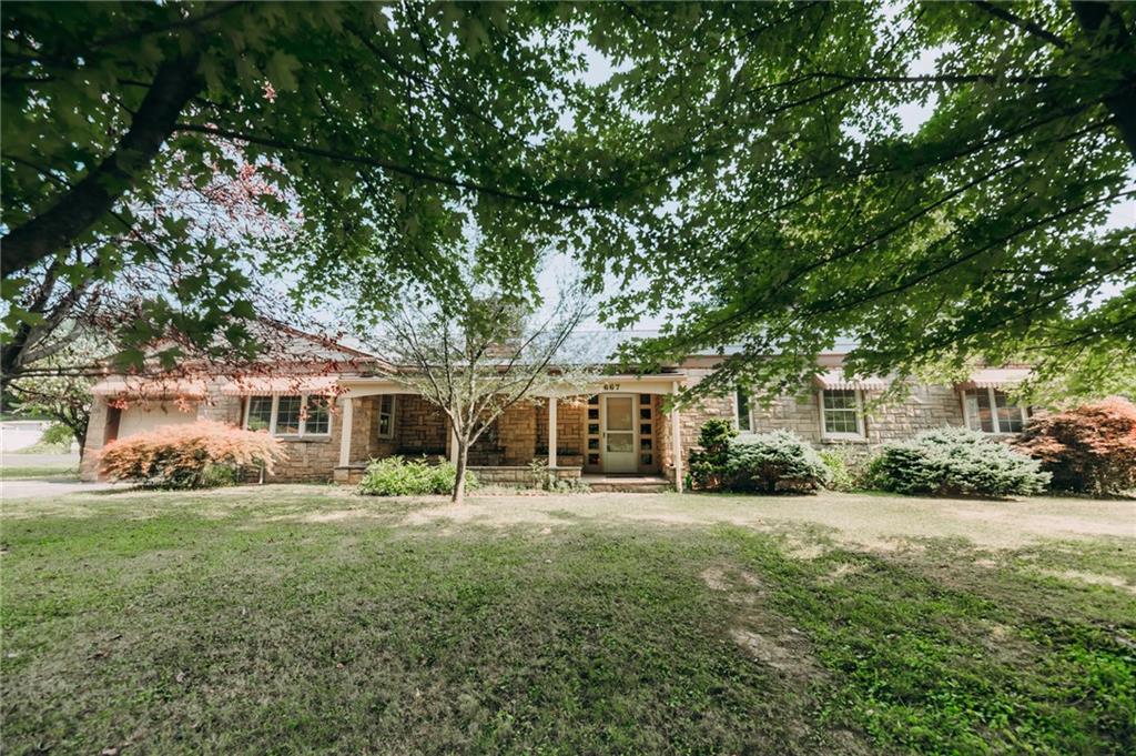 667 East Pike Road Indiana, PA 15701 - Photo 1 of 35 a front view of a house with a yard