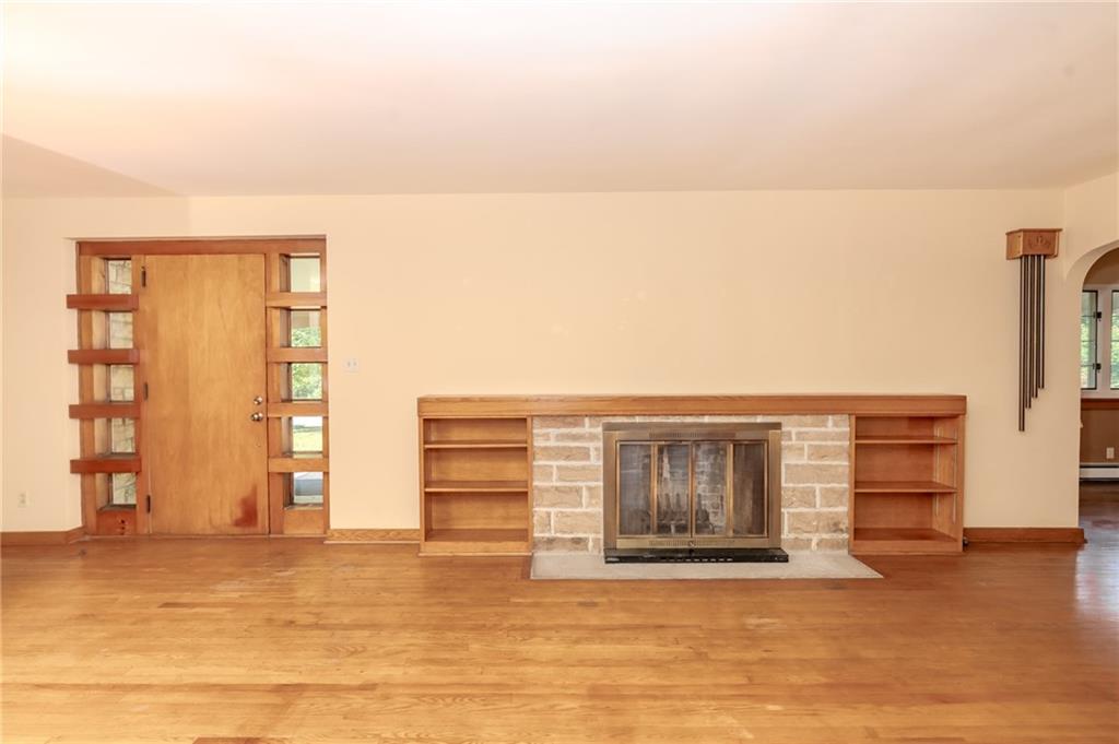 667 East Pike Road Indiana, PA 15701 - Photo 5 of 35 a view of an empty room with wooden floor and a window