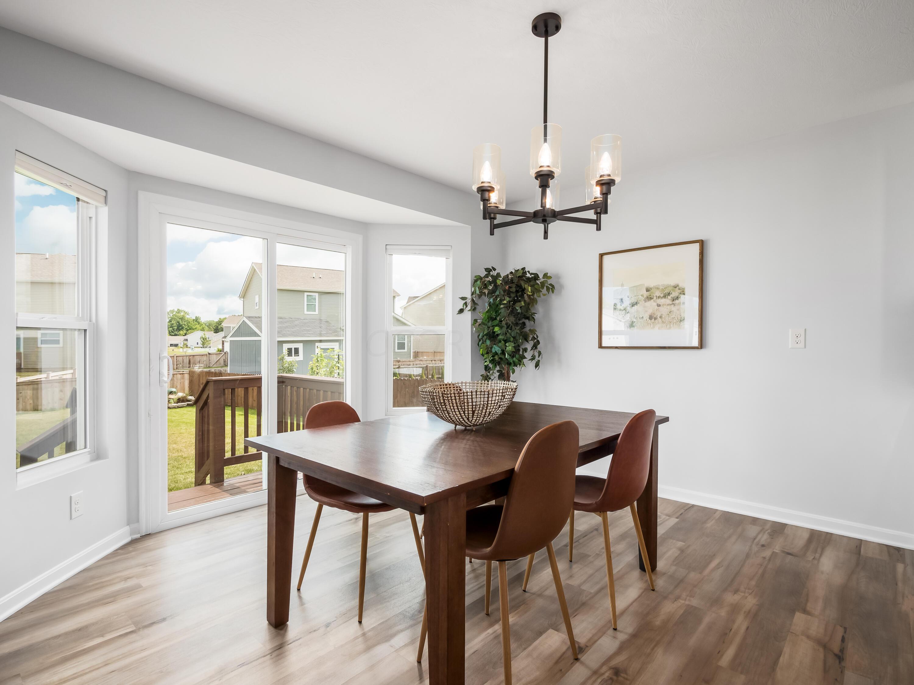 489 Randall Road Delaware, OH 43015 - Photo 11 of 35 Eating area with bay slider to backyard