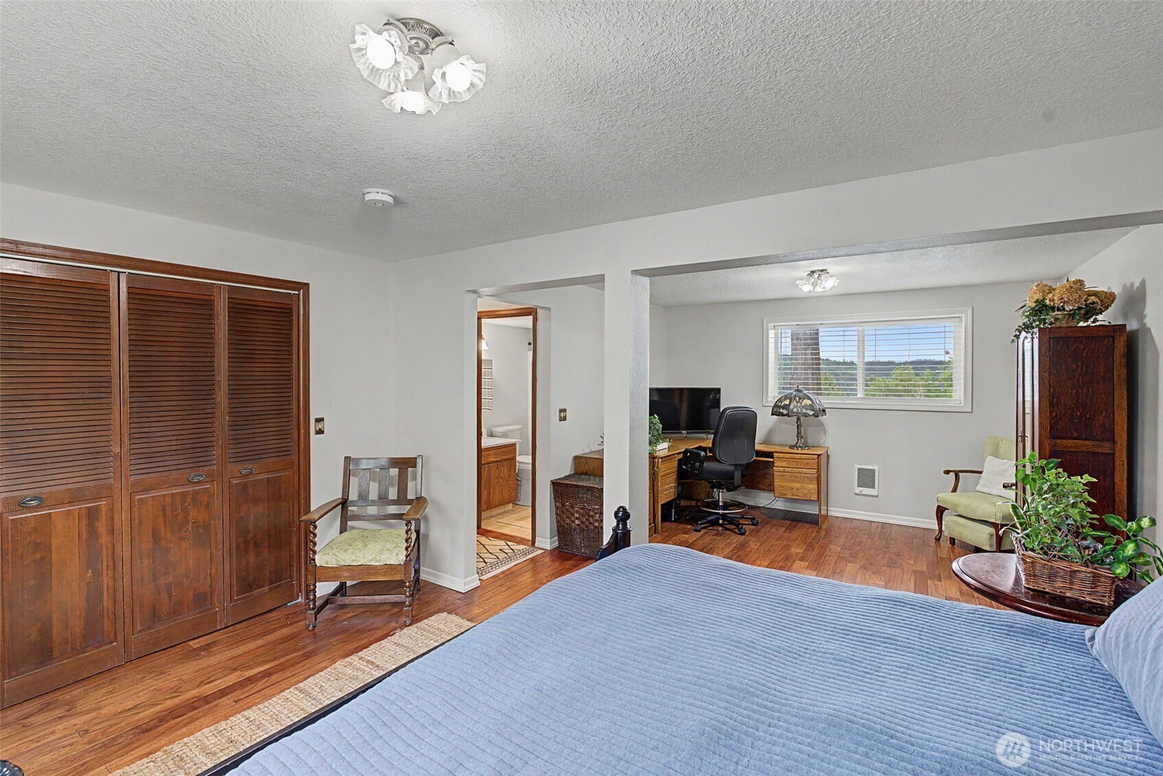 1611 Ham Hill Road Centralia, WA 98531 - Photo 31 of 40 a living room with furniture and a chandelier