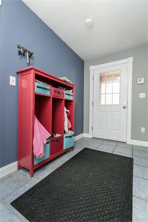 131 Harvard Road Bolton, MA 01740 - Photo 14 of 30 an empty room with wooden floor and windows
