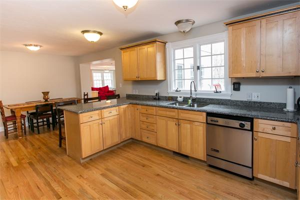 131 Harvard Road Bolton, MA 01740 - Photo 2 of 30 a kitchen with a sink cabinets and window