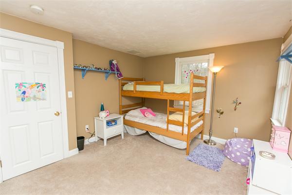 131 Harvard Road Bolton, MA 01740 - Photo 24 of 30 a bedroom with a bed and a window