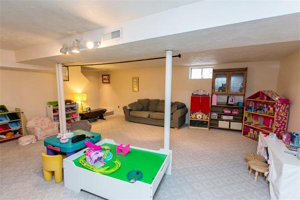 131 Harvard Road Bolton, MA 01740 - Photo 28 of 30 a bed room with furniture and a gate