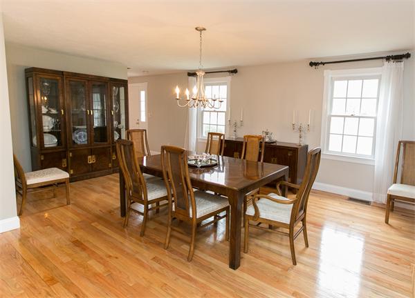 131 Harvard Road Bolton, MA 01740 - Photo 9 of 30 a view of a dining room with furniture window and outside view