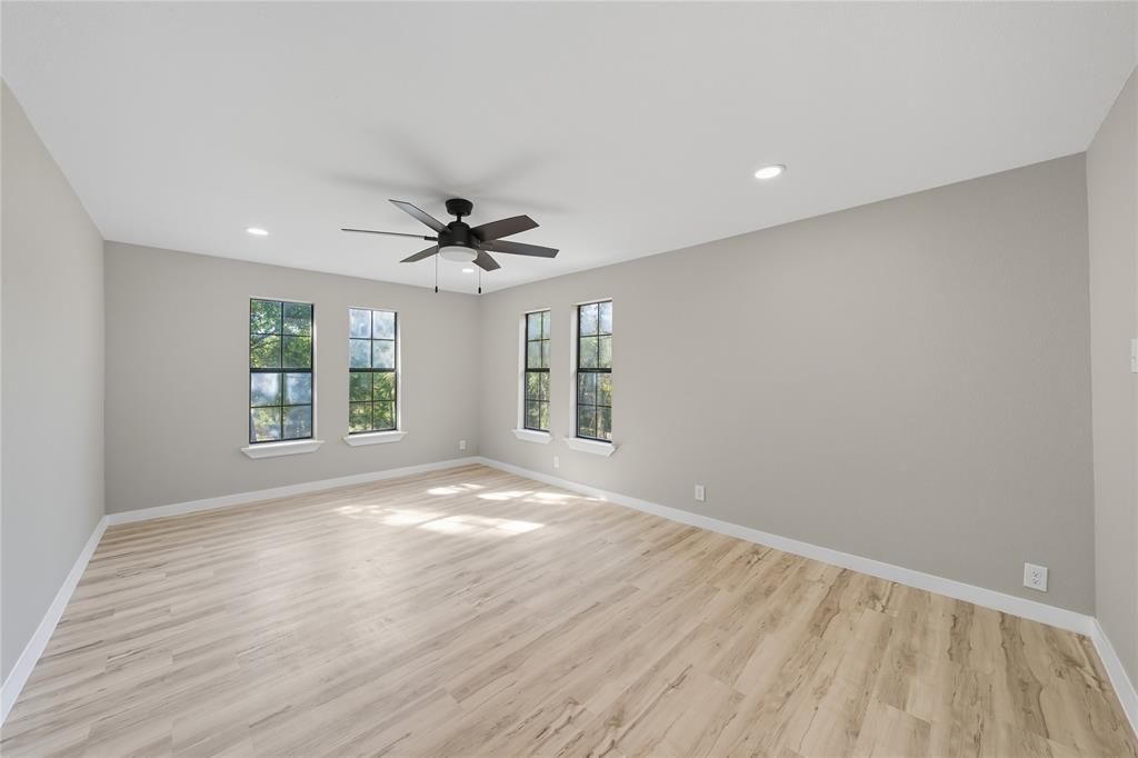 5393 Fm 2892 Athens, TX 75752 - Photo 17 of 25 a view of an empty room with a window and wooden floor