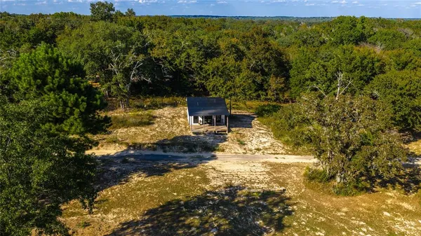a view of a back yard of the house