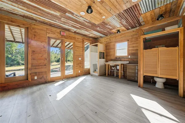 a view of an empty room with a window
