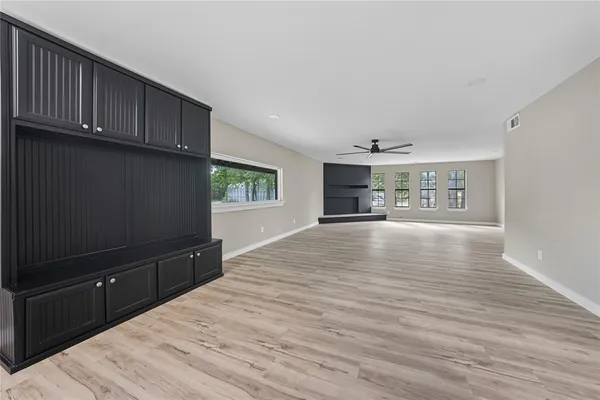a view of kitchen with wooden floor